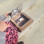 cooking smores in solar-powered ovens at the library | wrapped up in books